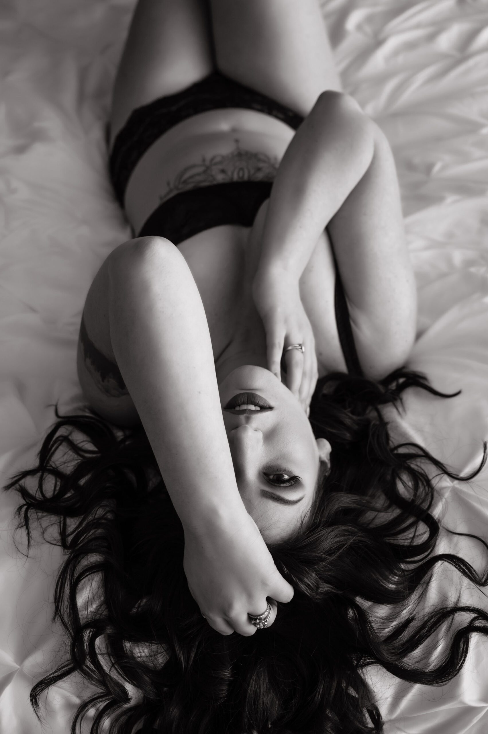 woman posing for a boudoir photoshoot
